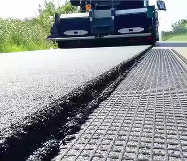 Basalt mesh reinforcing a road surface
